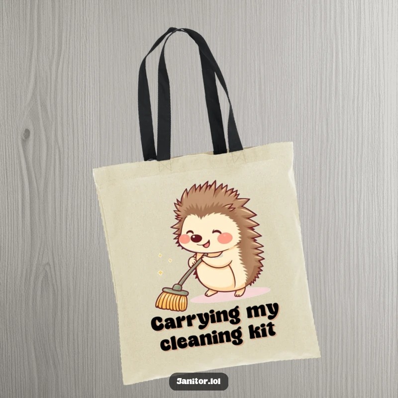 Funny hedgehog pushing a small, sparkling push broom, shown on a tote bag, ready for errands and a good laugh.